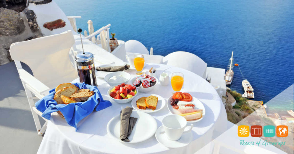 Breakfast on a terrace overlooking the sea in Oia, Santorini, Cyclades, Greece