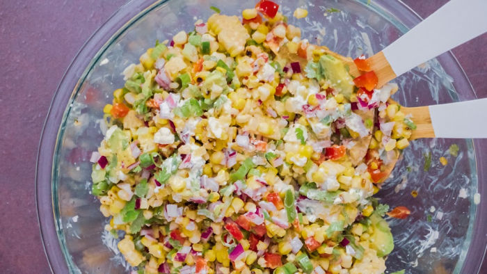 Step by step. Preparing traditional mexican street corn salad.